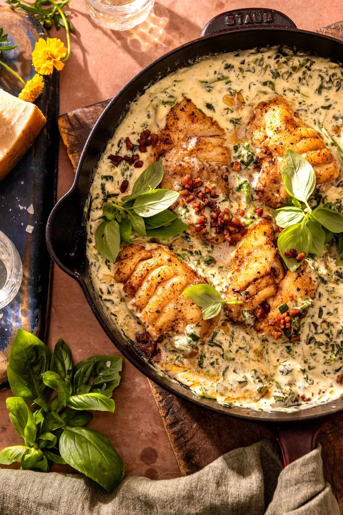 Garlic Butter Cod Florentine with White Wine Cream Sauce