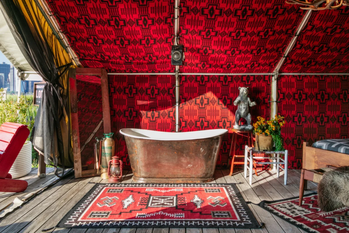 The Urban Cowboy Tent Brings Rustic Maximalism to the Shores of Governors Island